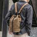 休闲帆布包水桶包单肩双肩包两用背包男女文艺质感简约拉绳圆筒包