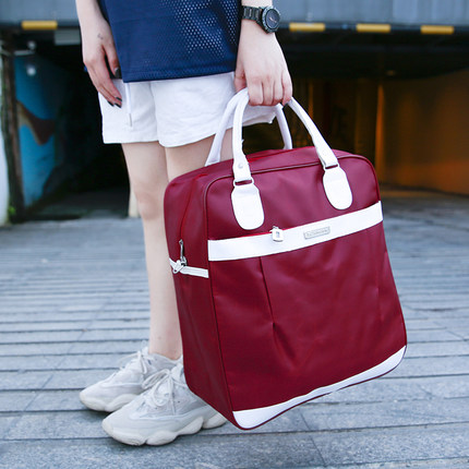 新款小容量防水旅行包手提单肩行李包装衣服出游包背面可套拉杆潮