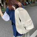 日韩无印风大容量简约百搭双肩包男女大学生初中生书包旅行背包潮