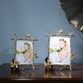 轻奢合金相框6寸7寸结婚纱照卧室摆台像框架样板间装饰品房间摆件