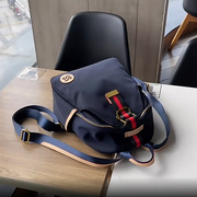 质感大容量双肩包2024新款欧美时尚男女通用书包上班通勤撞色背包
